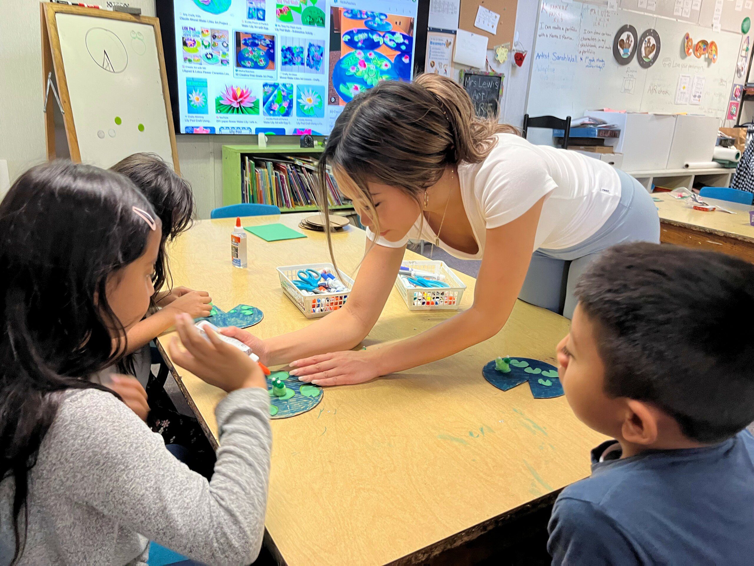 Sarah Wall with children for her art to heart program