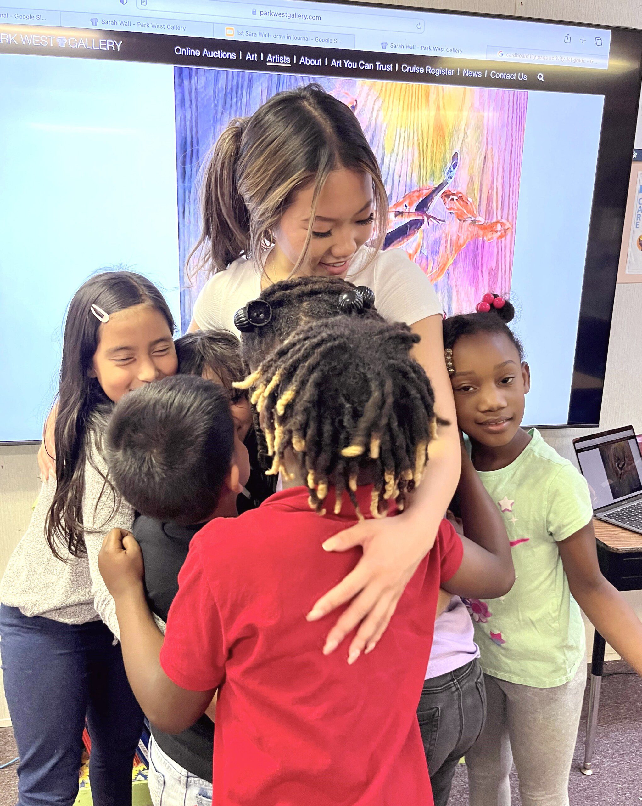 Sarah Wall with children for her art to heart program