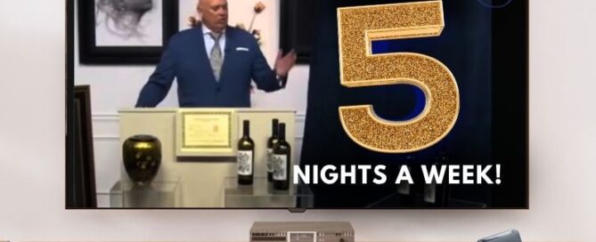 tv showing the fine art auction live